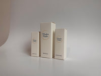 Three white boxes with Machis Nadin branding on a gray background.